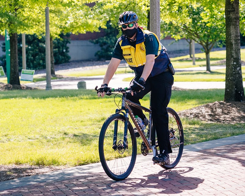 UAB Police Officer patrolling on a bicycle.