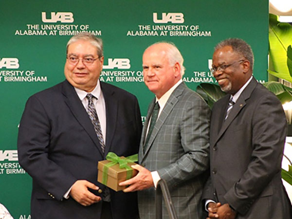 Rivera receiving his award. 