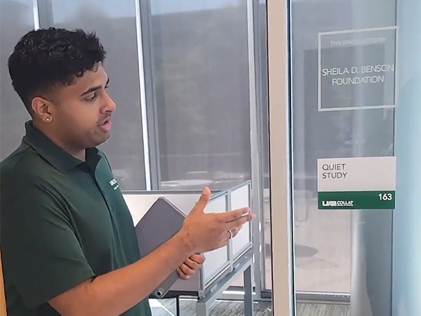 Collat business student Vidhur Prasanna provides a tour of new study spaces at Collat 