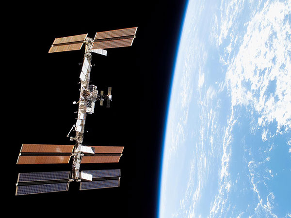 The International Space Station orbiting earth (image courtesy of NASA). 