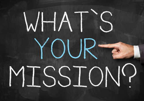 "What's Your Mission" written on a blackboard.