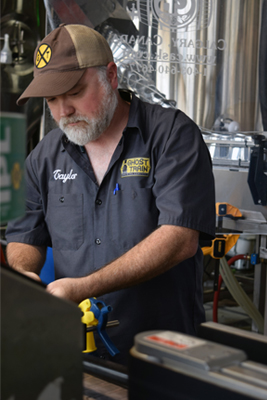 DeBoer working in his brewery. 