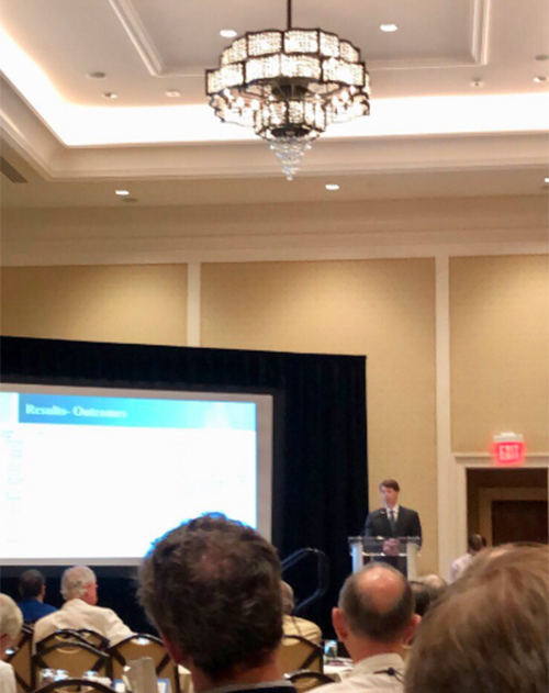 UAB orthopedic surgery resident Dr. Scott Mabry presents at the 2019 annual meeting of the Alabama Orthopaedic Society and Mississippi Orthopaedic Society in Destin, Florida. (Photo via @OrthoAlabama on Twitter)