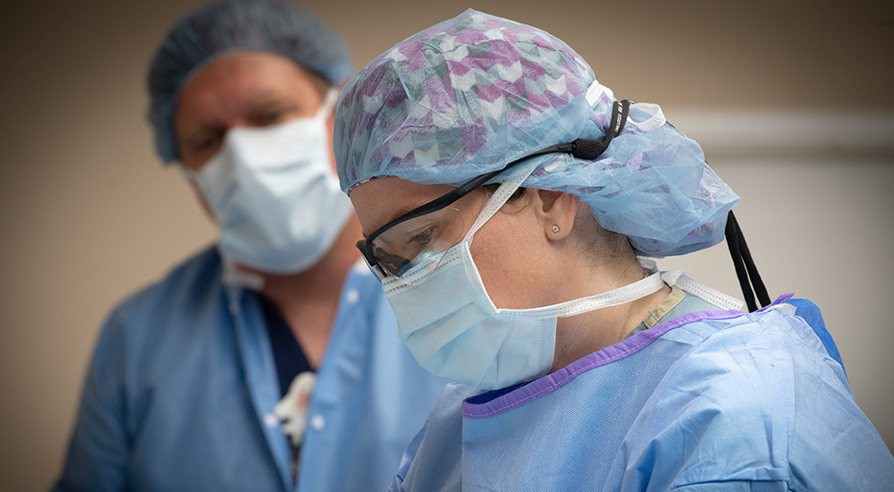 Dr. Jayme Locke preps a donated kidney for kidney transplantation surgery as part of UAB's Kidney Chain surpassing 100 surgeries, 2018.