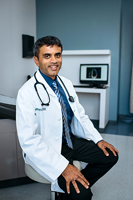 Environmental shot of Dr. Pankaj Arora, MD (Assistant Professor, Cardiovascular Disease) wearing white medical coat, 2018.