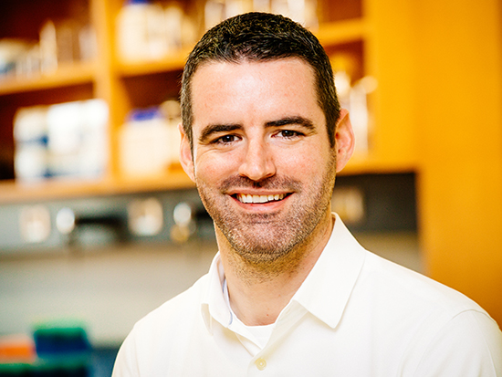 Environmental head shot of Dr. Jeremy Day, PhD (Assistant Professor, Neurobiology) in a laboratory in the Shelby Biomedical Research Building, 2018.