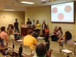Physical therapy students use the Cup Song to teach new skill