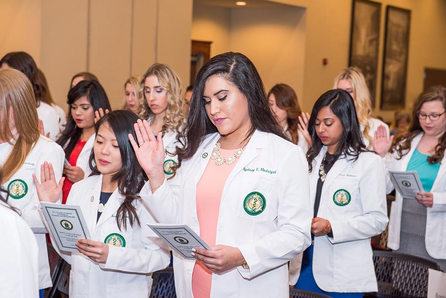 Optometry class of 2020 pledging at their white coat ceremony.