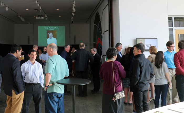 Event attendees mingling at reception at the Abroms-Engel Institute for the Visual Arts