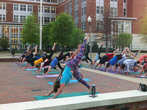 4. Practice yoga on the Campus Green.