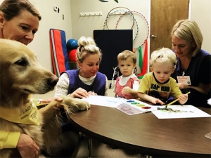 UAB pairs with Hand in Paw to make significant (and snuggly) impact in city classrooms