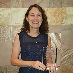 Carolyn Da Silva with award.