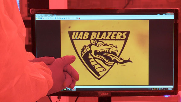 Photo of UAB Blazers shield on lab computer screen