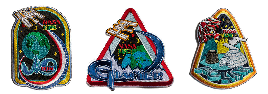 Photo of three mission patches