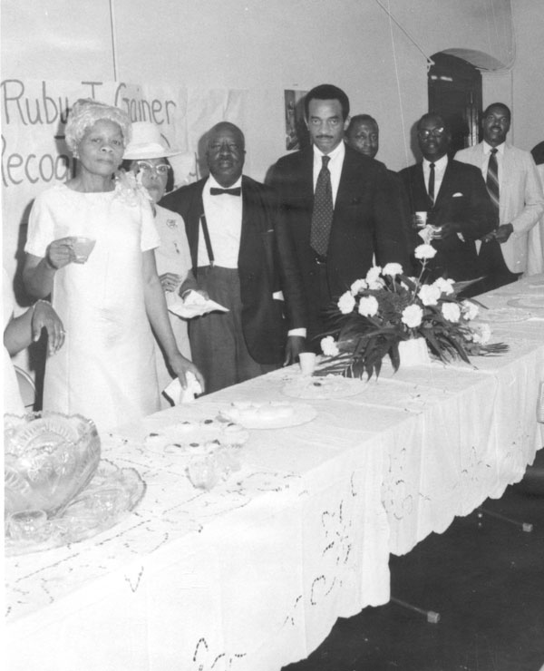 Photo of Ruby Jackson Gainer with her brother, Emory O. Jackson, at a celebration.