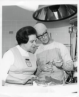 Dr. Kirklin with a nurse in the operating room.
