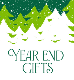 Illustration of green and white pine trees under snowfall with words "year end gifts."