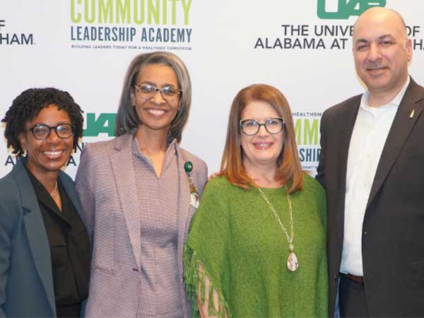 Kathy Boswell, Dr. Stephanie Yates, Valeta Neal, and Hafiz Chandiwala of Coca-Cola Bottling Co. United