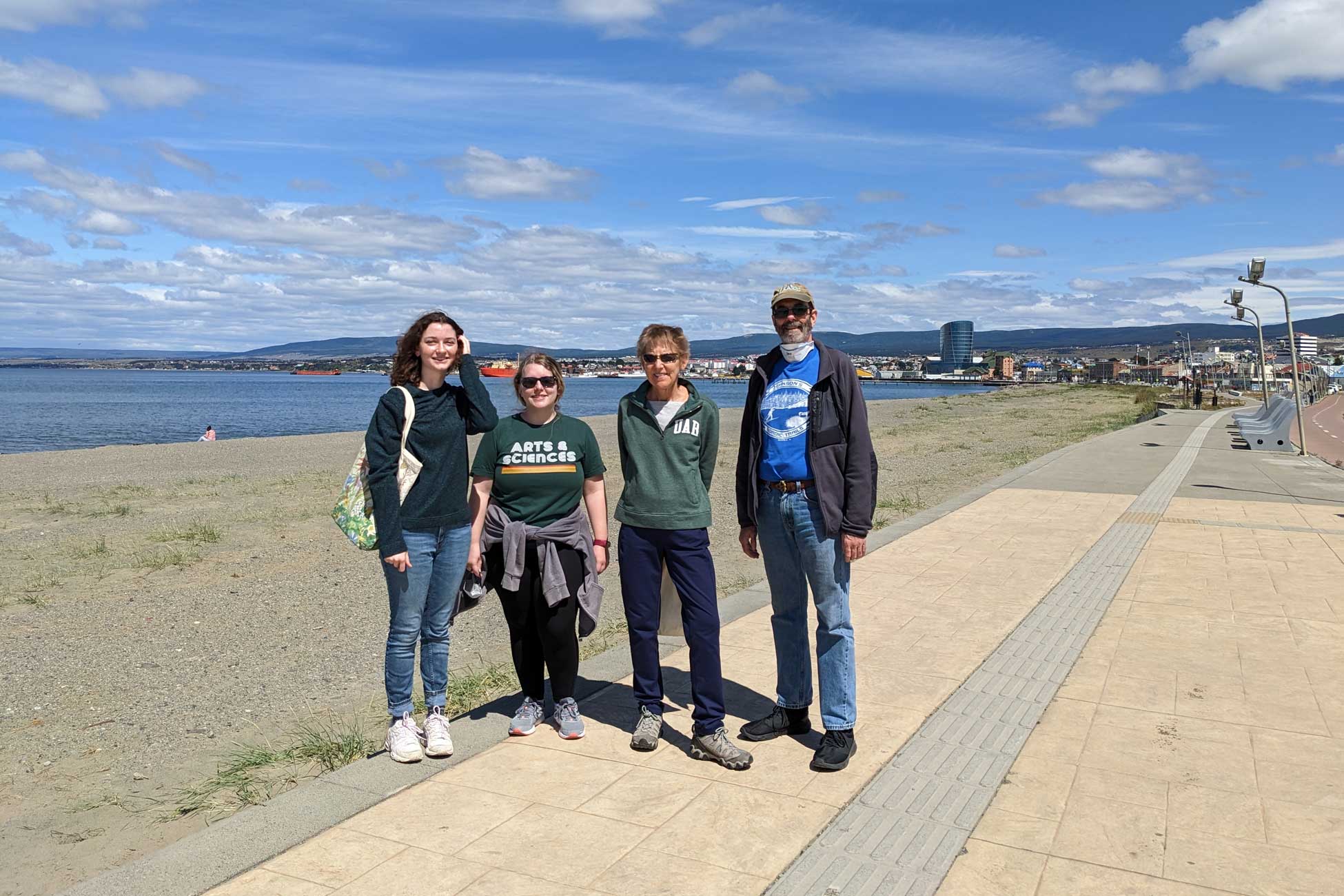 Hannah, Addie, Maggie and Chuck Amsler in Punta Arenas, the Laurence M. Gould far in the background. 