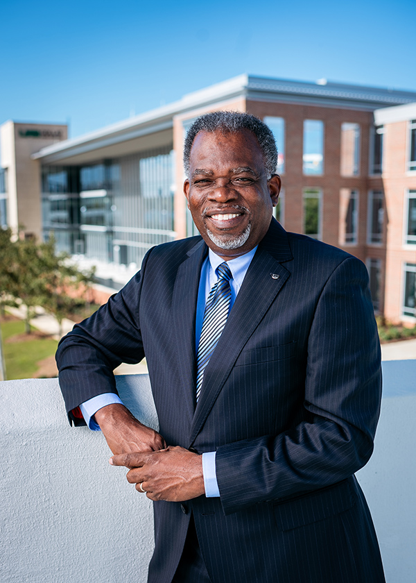 Dean Eric Jack in front of the Collat School of Business