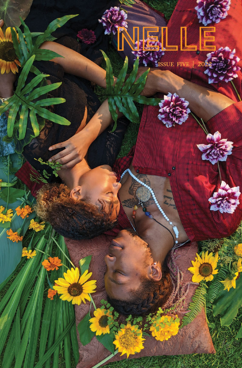 Cover of issue five - a Black male and female couple sleeping on the grass, surrounded by flowers. Her head is resting on his shoulder, he is smiling. 