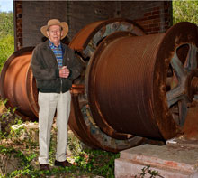 James Goodson stands at the Redding Shaft Mine, not far from the site of the Woodward Iron camp where he was born. Photo: Eric McFerrin/Red Mountain Park. 