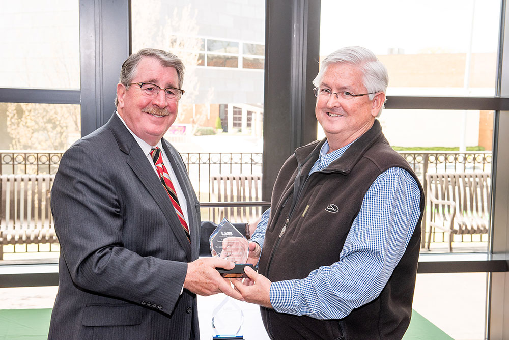 Dean Palazzo congratulating David Brasfield.