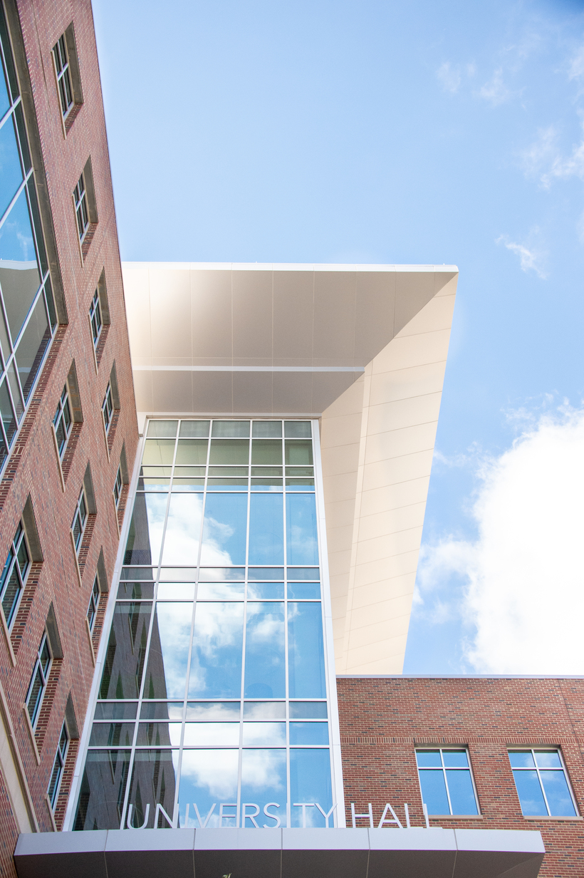 Close-up, several floors of windows of University Hall, Spring 2020.