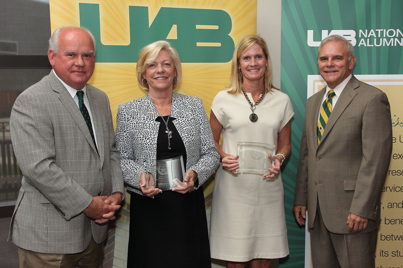 Alum Excellence President Watts and two alum