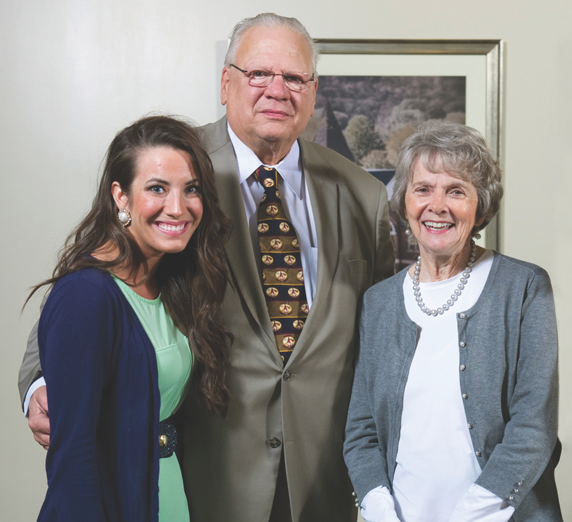 ￼Blakely Mann, Dr. John Wittig and Lucy Kennedy.
