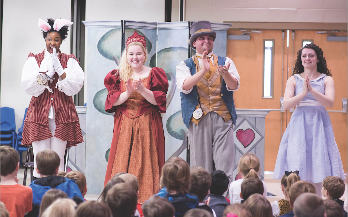 UAB Theatre students in the Alice in Wonderland Touring Company perform for children at Southminster Day School in Birmingham.