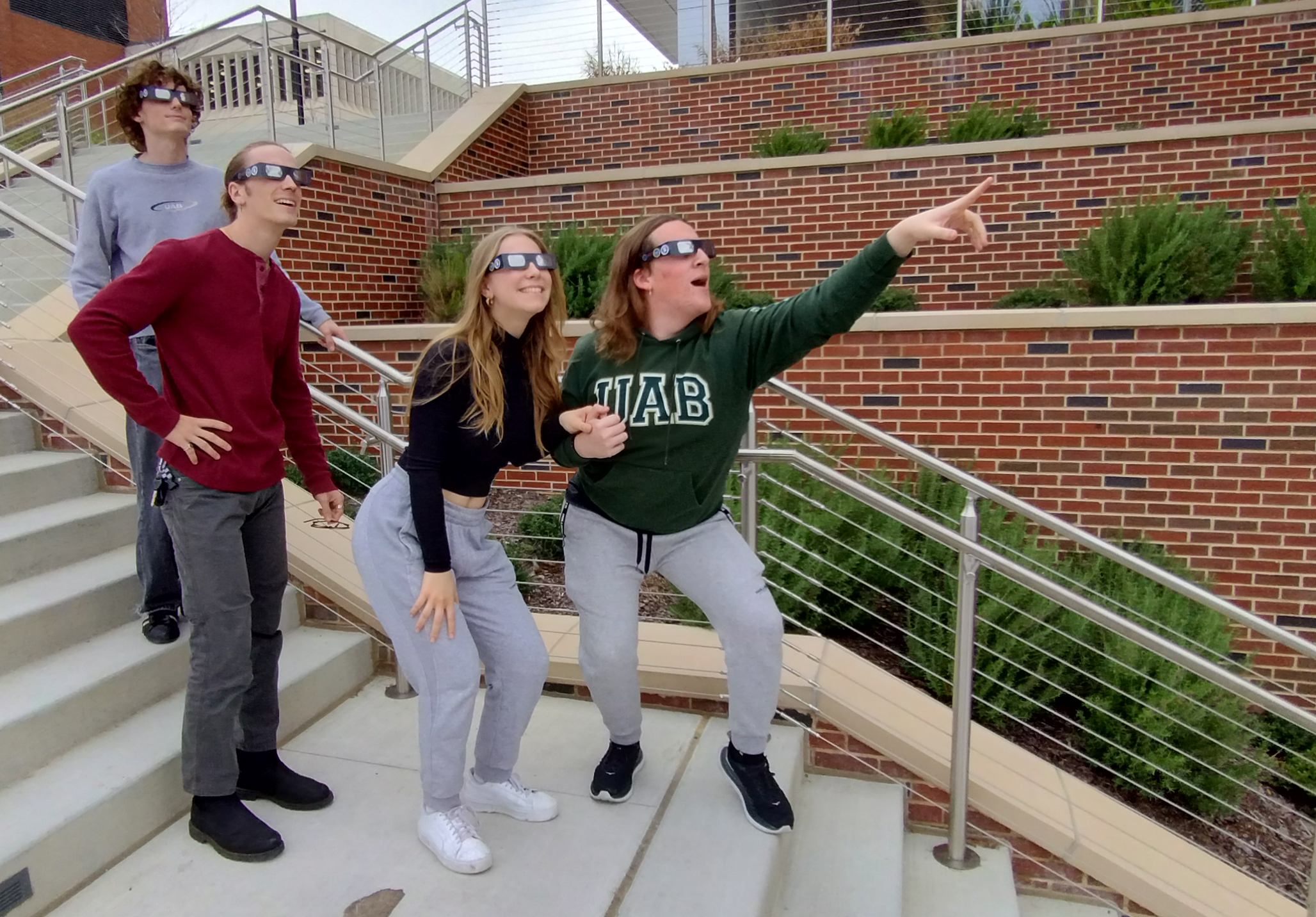 Photo of the Astronomy Club wearing solar eclipse glasses