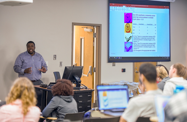 Professor teaching an undergraduate psychology course. 