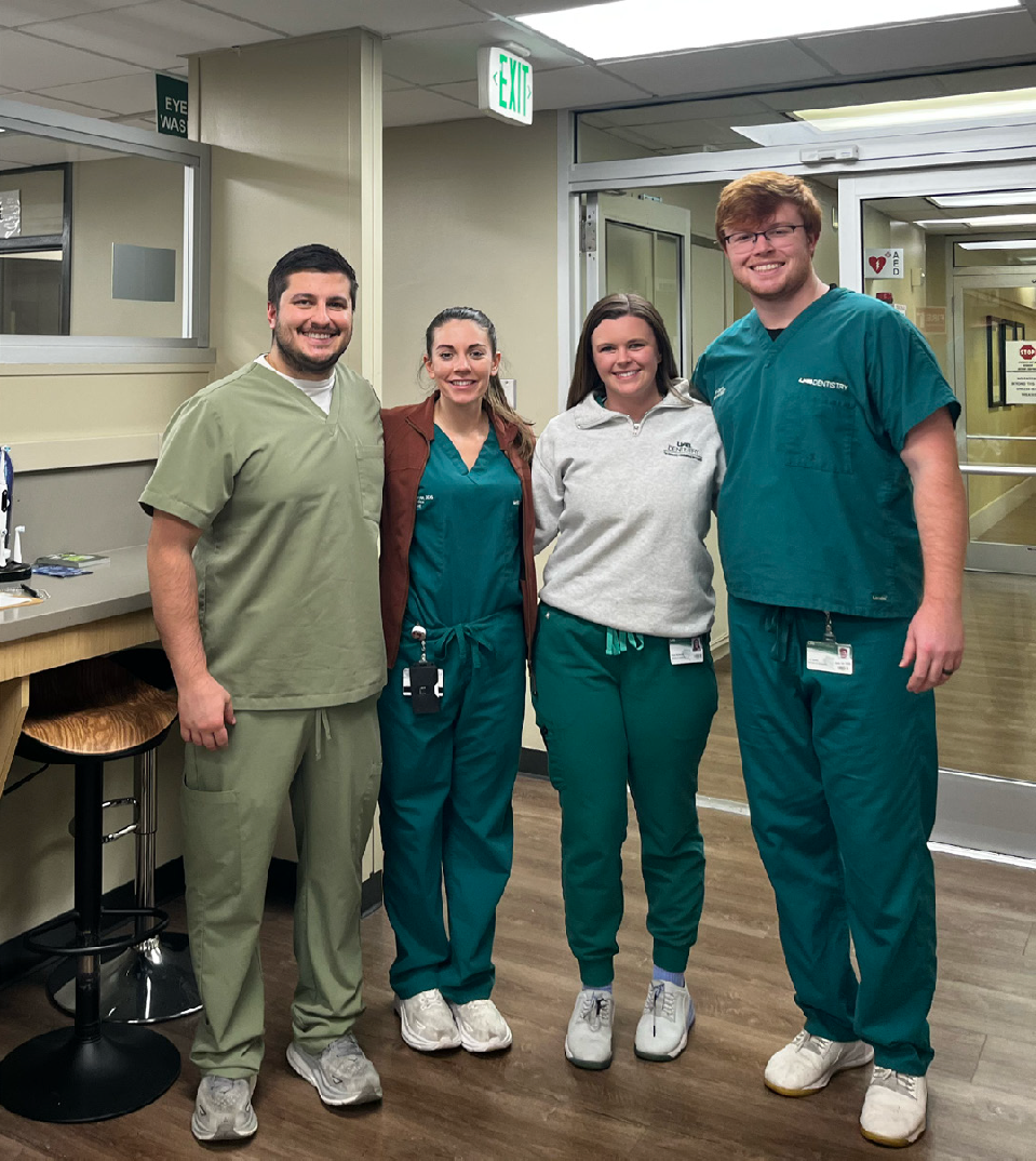 From Left to right: Dr. Molisani, Dr. Stephanie Sawyer, Kayla Hammer (D4), Ian Davis (D3)