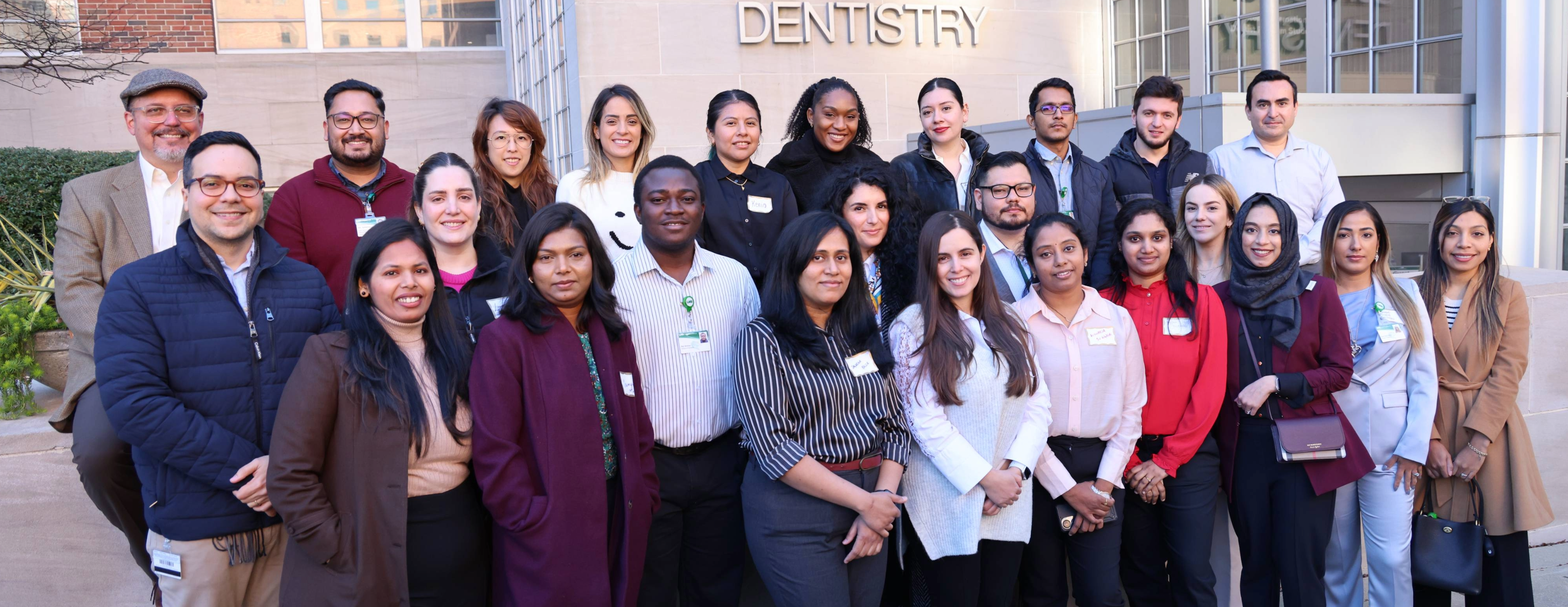 Group photo of the IDP Class of 2027 with Dr. Mitchell