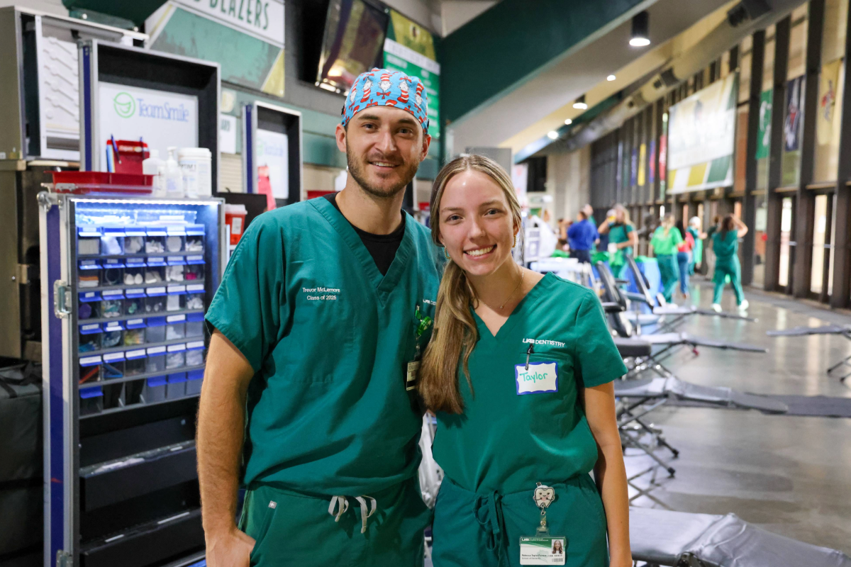 Trevor Mclemore and Taylor Powers UAB SOD students at UAB and TeamSmile event 2024