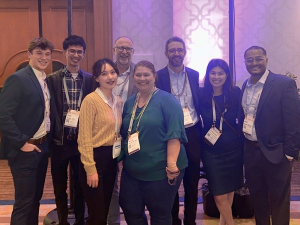 Pictured (R-L): Alex Boulay, Toby Liu, Jade Kim, Interim Dean Nico Geurs, Wendy Scripps, Dr. Ramzi Abou-Arraj, Dr. Francesca Velardi, and Kush Patel