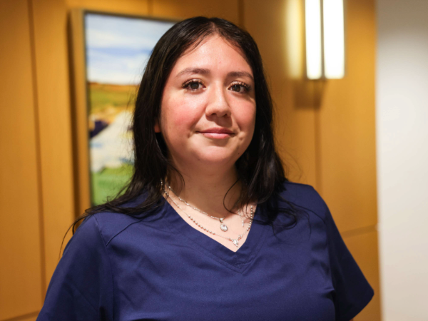 Dental Assistant - photo of woman in blue scrubs