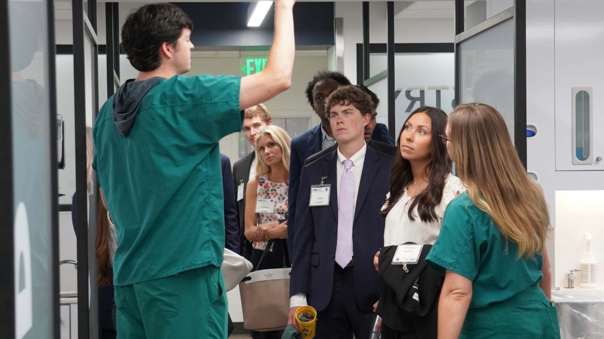 Established dental students leads new dental students in clinic tour