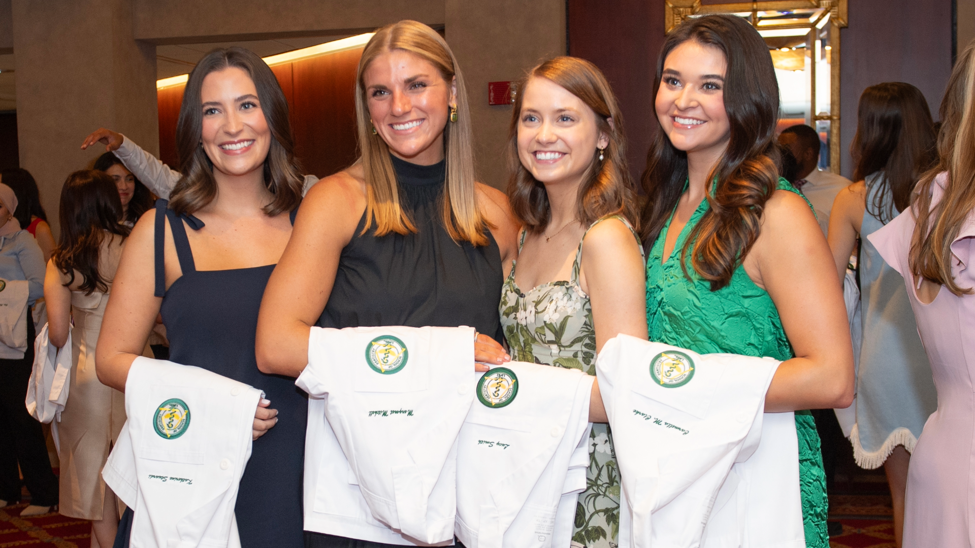 Four dental school studetns at White Coat Ceremony 2024
