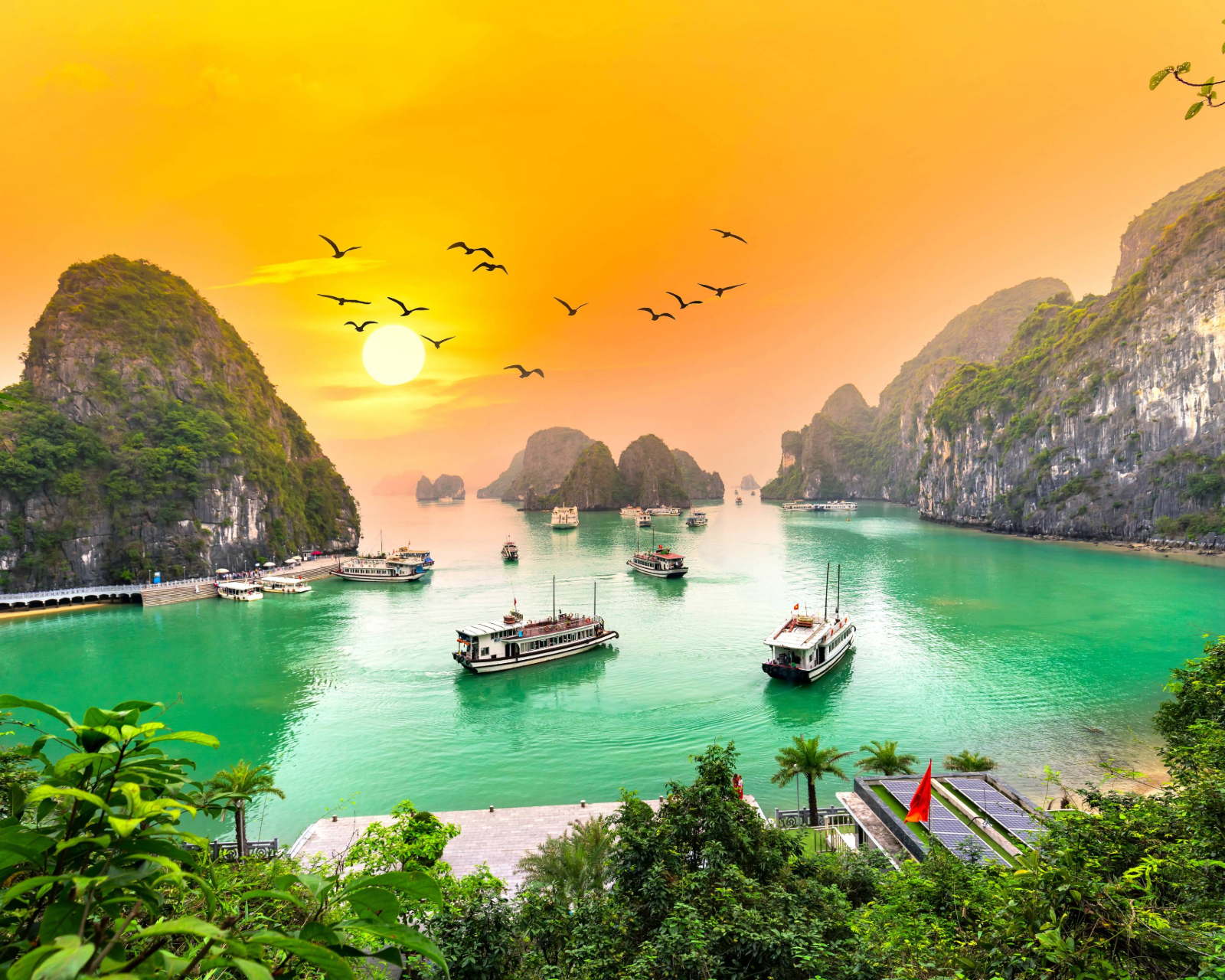 Dreamy sunset landscape Halong Bay, Vietnam view from above. AdobeStock_398817652