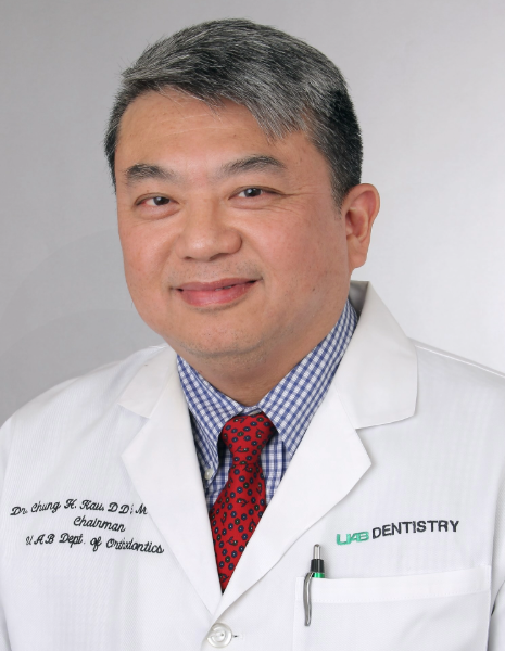 Man in white coat labeled Dr. Chung How Kau along with credentials and UAB Dentistry