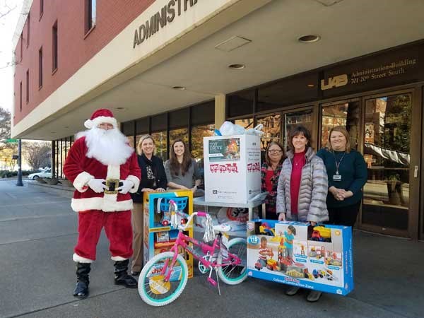 toys for tots - Nancy Parsons pictured 3rd from right