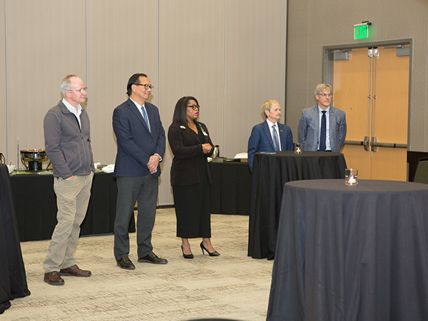 People listening to speaker