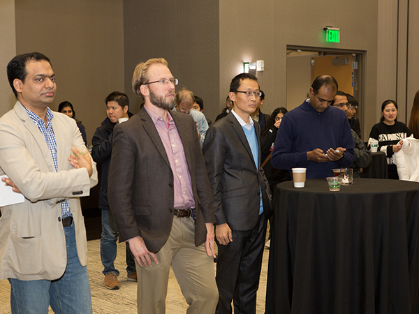 People listening to speaker