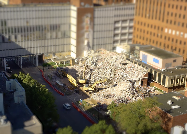 Mid-demolition photo of the Kracke Building