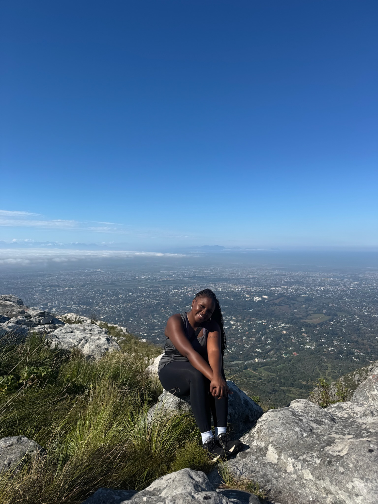 Keziah on the edge of a mountain.