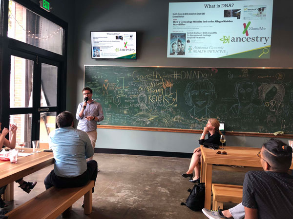 Jack Schoelz speaking in front of an audience.