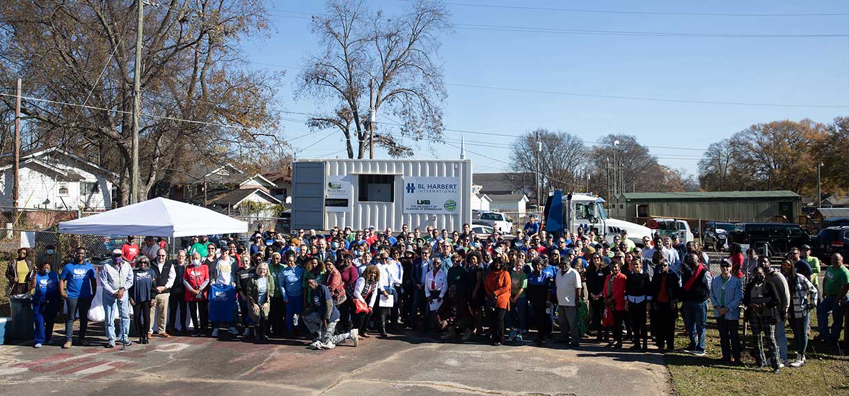 Large group shot of Bush Hill volunteers in a parking lot.