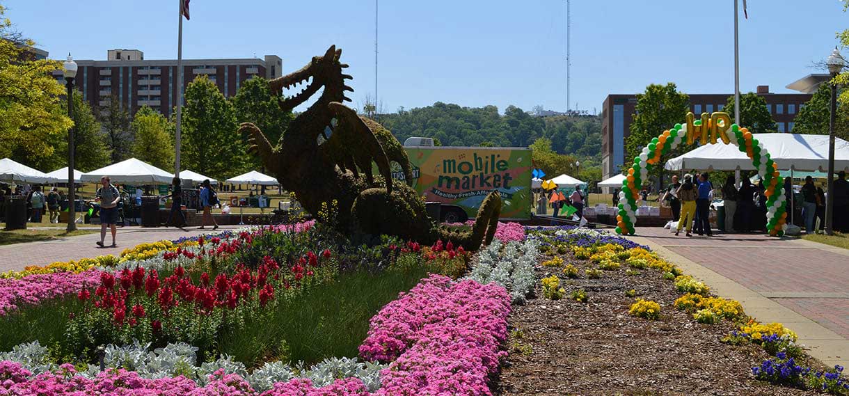 The Blaze topiary on the UAB Green in the center of a Live HealthSmart campus fair.